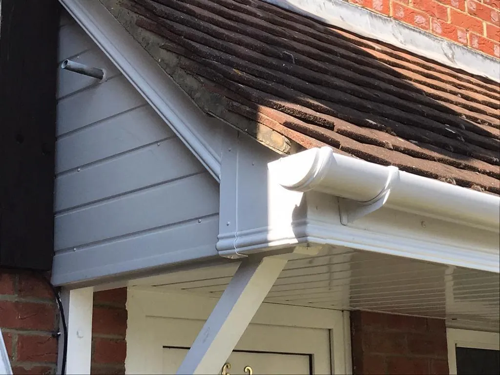 New white uPVC guttering and bargeboard on a porch